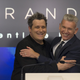 Designer Isaac Mizrahi (L) and Robert D'Loren, Chairman and Chief Executive Officer of Xcel Brands, Inc. pose together before ringing the closing bell at the Nasdaq Market site in New York September 2, 2015. REUTERS/Brendan McDermid - RTX1QT76